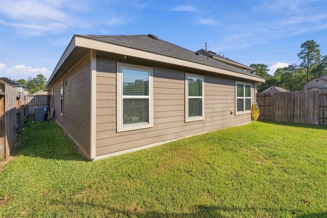 1207 Blue Hazel Court, Magnolia, TX 77362