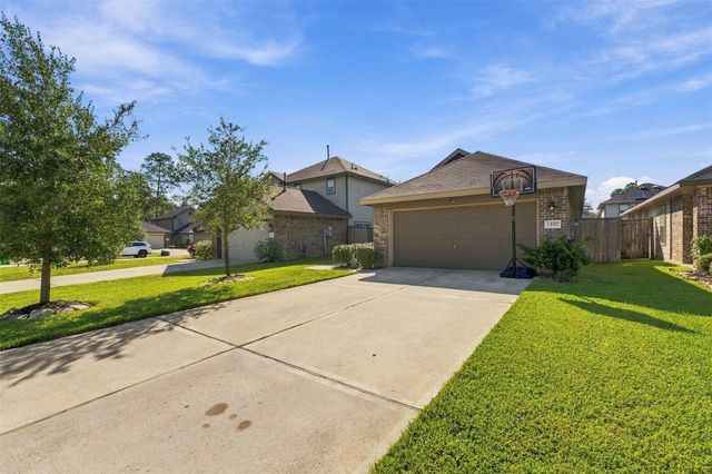 1207 Blue Hazel Court, Magnolia, TX 77362