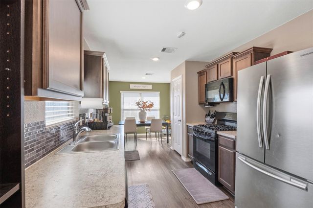 1207 Blue Hazel Court, Magnolia, TX 77362