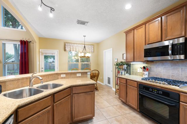 31103 Silverwood Oaks Court, Spring, TX 77386