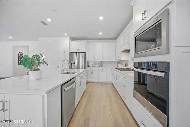 942 ROOSTER HOLLOW Way, Middleburg, FL 32068