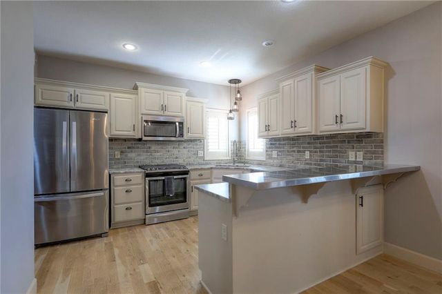 1305 ASHDOWN Circle, Raymore, MO 64083