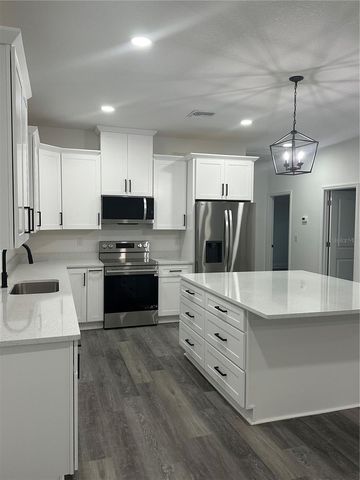 13311 MIDWAY AVENUE, Astatula, FL 34705