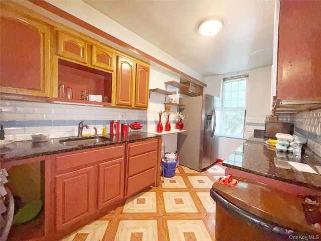 103-55 104th Street, Ozone Park, NY 11417