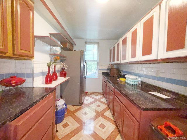 103-55 104th Street, Ozone Park, NY 11417
