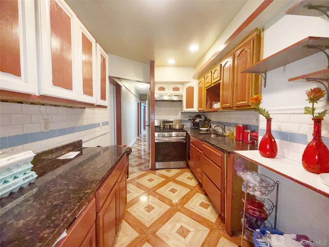 103-55 104th Street, Ozone Park, NY 11417