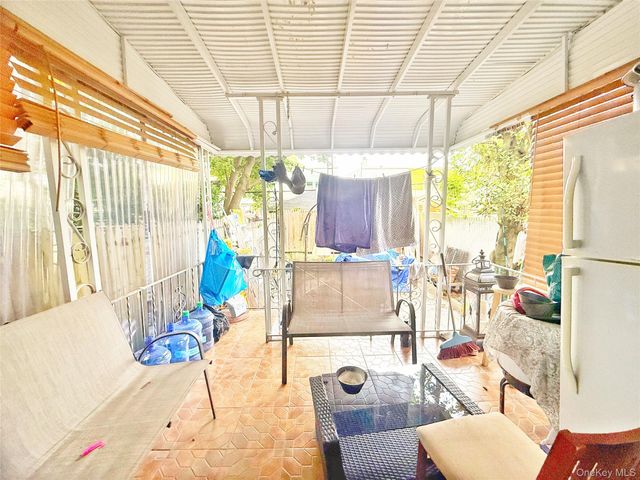 103-55 104th Street, Ozone Park, NY 11417