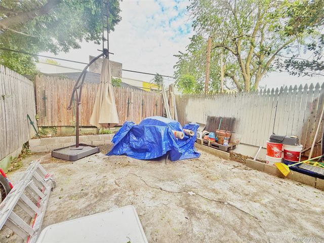 103-55 104th Street, Ozone Park, NY 11417