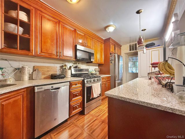 103-55 104th Street, Ozone Park, NY 11417