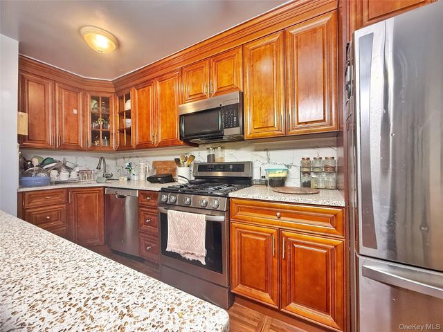 103-55 104th Street, Ozone Park, NY 11417