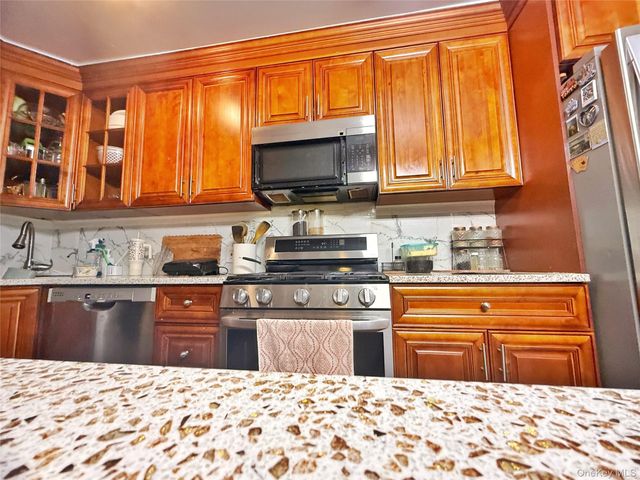 103-55 104th Street, Ozone Park, NY 11417