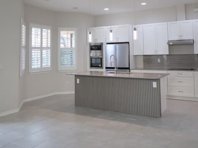 13183 WOODFORD STREET, Orlando, FL 32832