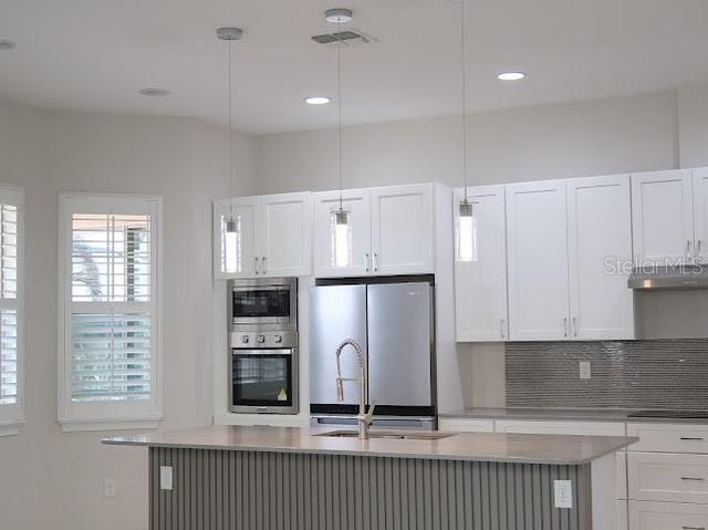 13183 WOODFORD STREET, Orlando, FL 32832