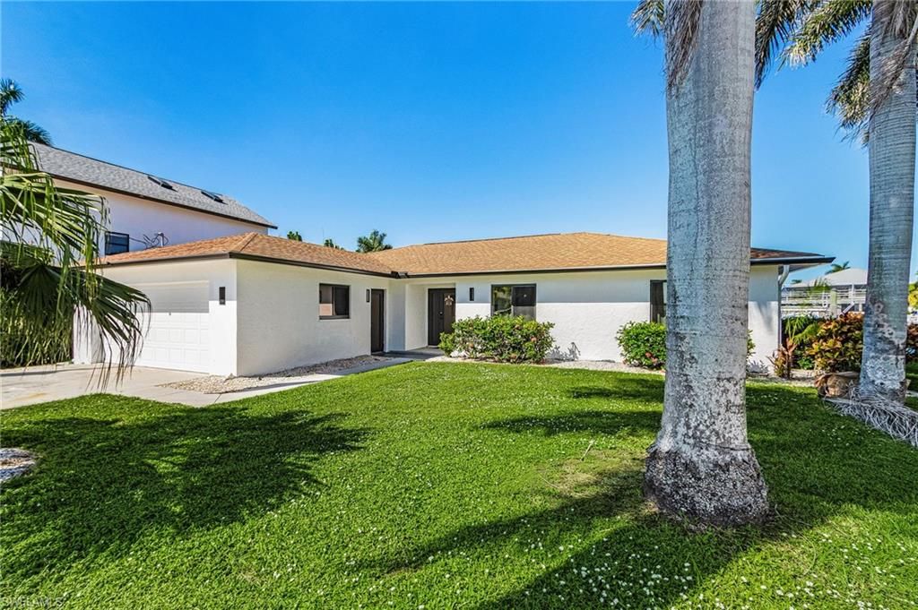 121 JAMAICA DR, NAPLES, FL 34113 — photo 2
