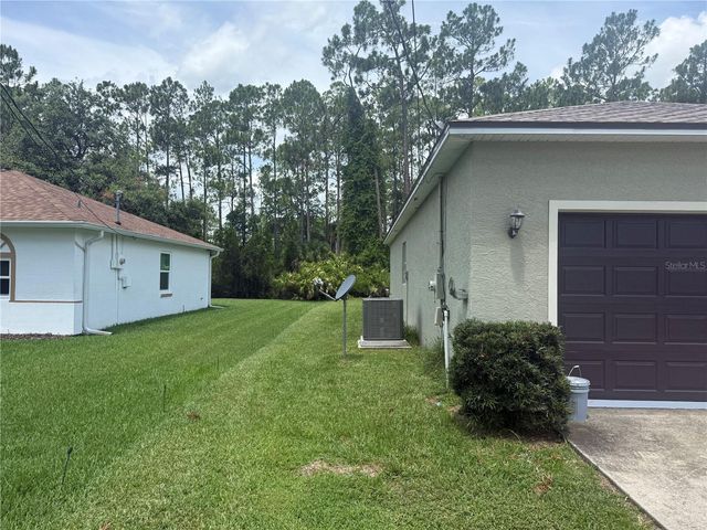 18 POINBURY DRIVE, Palm Coast, FL 32164