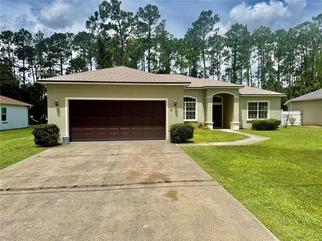 18 POINBURY DRIVE, Palm Coast, FL 32164