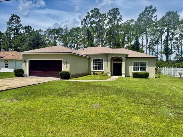 18 POINBURY DRIVE, Palm Coast, FL 32164