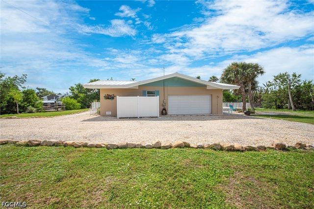 5885 Pine Tree DR, Sanibel, FL 33957