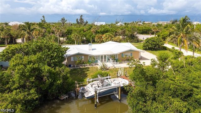 5885 Pine Tree DR, Sanibel, FL 33957