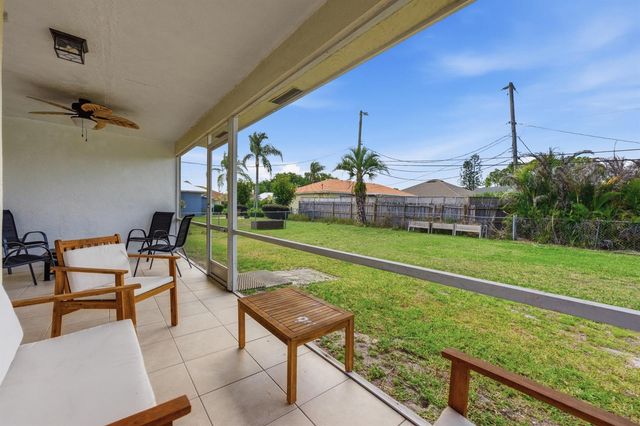 390 SE Cork Road, Port St. Lucie, FL 34984