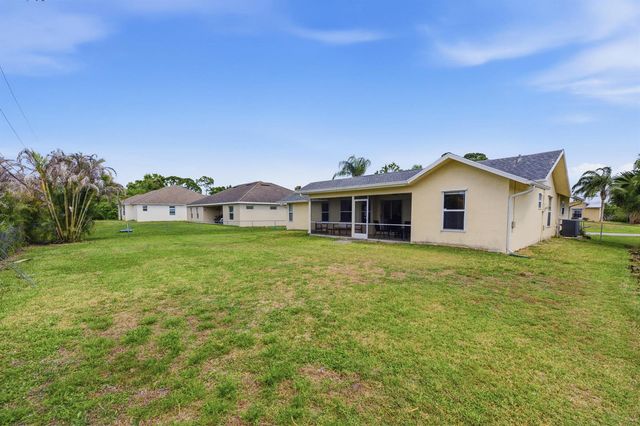 390 SE Cork Road, Port St. Lucie, FL 34984