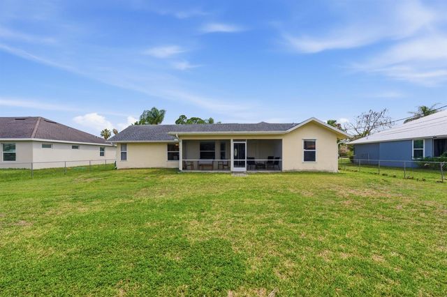 390 SE Cork Road, Port St. Lucie, FL 34984