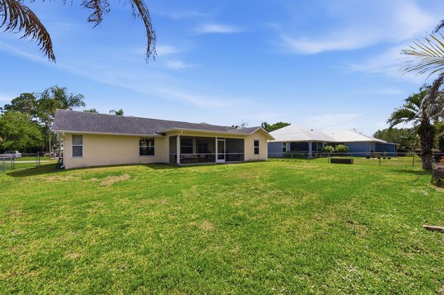 390 SE Cork Road, Port St. Lucie, FL 34984