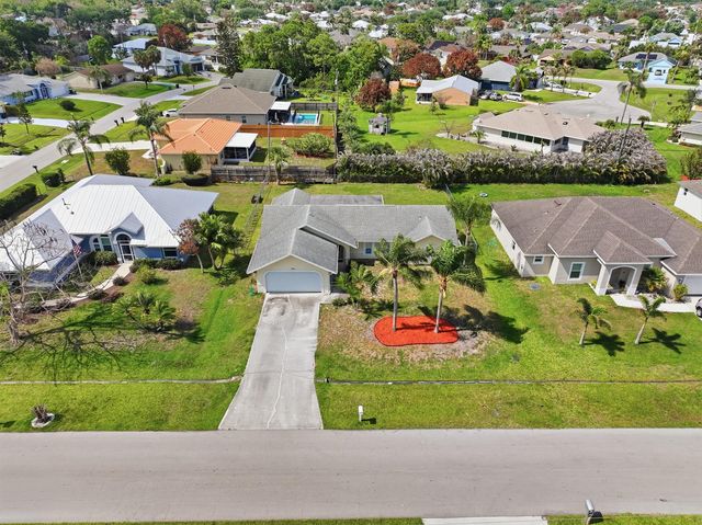 390 SE Cork Road, Port St. Lucie, FL 34984