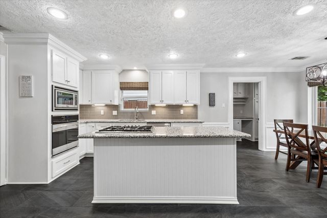 9410 Taidswood Drive, Spring, TX 77379