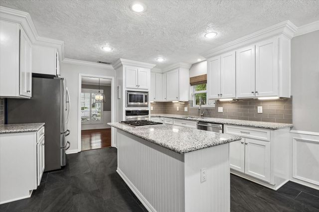 9410 Taidswood Drive, Spring, TX 77379