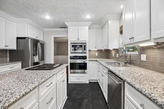 9410 Taidswood Drive, Spring, TX 77379