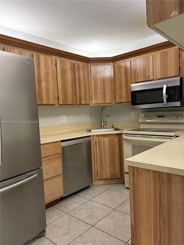 702 Sunny Pine Way A1, Green Acres, FL 33415