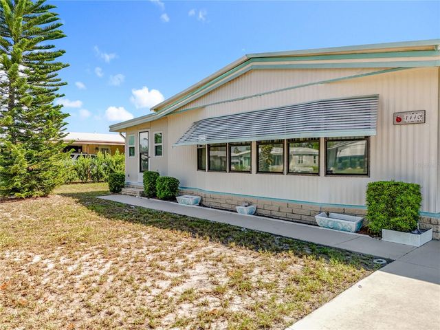1440 NASSAU CIRCLE, Tavares, FL 32778