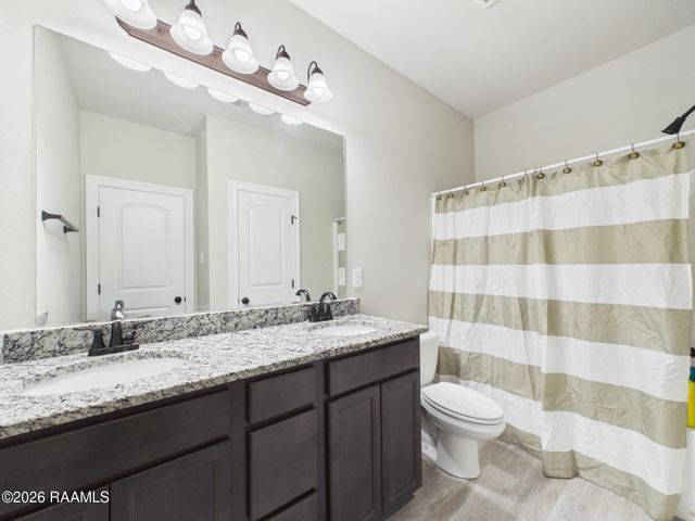 100 Sugar Crest Drive, Youngsville, LA 70592