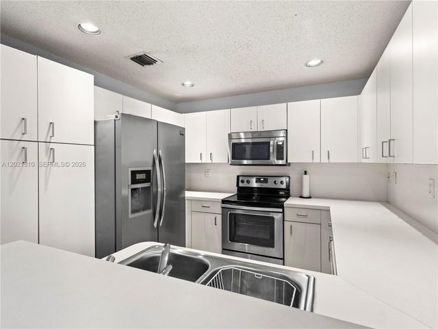 5033 NW 114th Ct, Doral, FL 33178