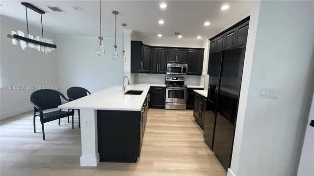 9936 Woodworth Ct, Wellington, FL 33414