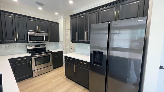 9936 Woodworth Ct, Wellington, FL 33414