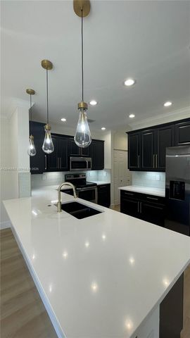 9936 Woodworth Ct, Wellington, FL 33414
