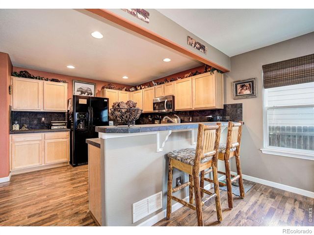 2385 School House Drive, Milliken, CO 80543