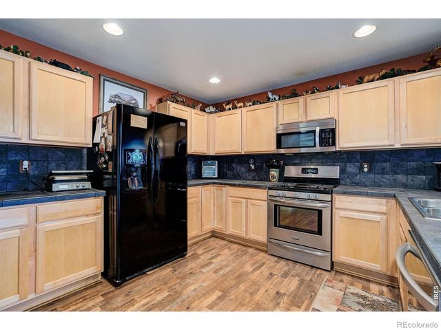 2385 School House Drive, Milliken, CO 80543