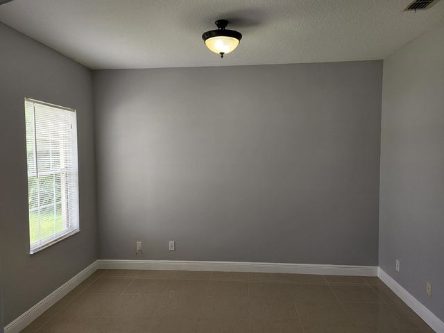 2466 SW Mercer Street, Port St Lucie, FL 34984