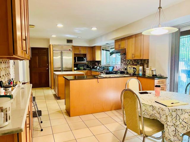 26-04 211th Street, Bayside, NY 11360