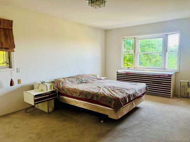 26-04 211th Street, Bayside, NY 11360