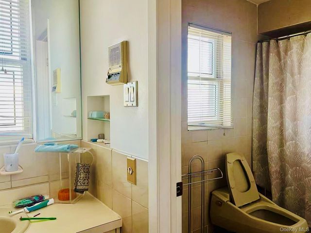 26-04 211th Street, Bayside, NY 11360