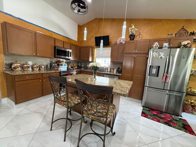 7743 Elwood Drive, Greenacres, FL 33467
