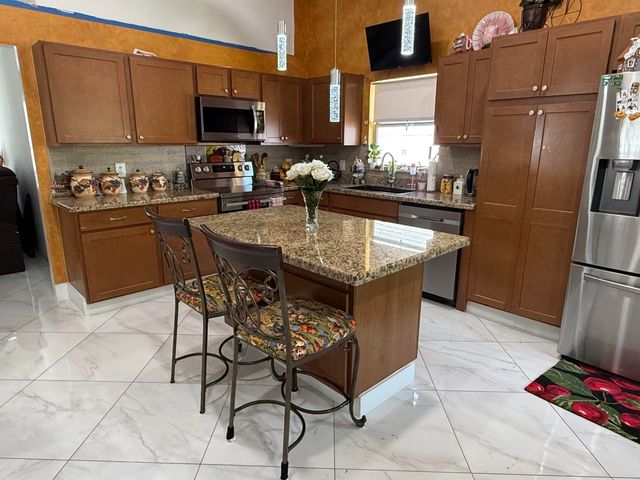 7743 Elwood Drive, Greenacres, FL 33467