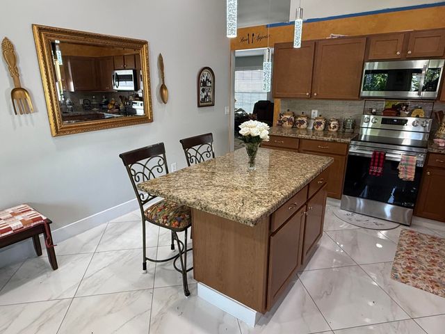 7743 Elwood Drive, Greenacres, FL 33467