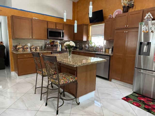 7743 Elwood Drive, Greenacres, FL 33467