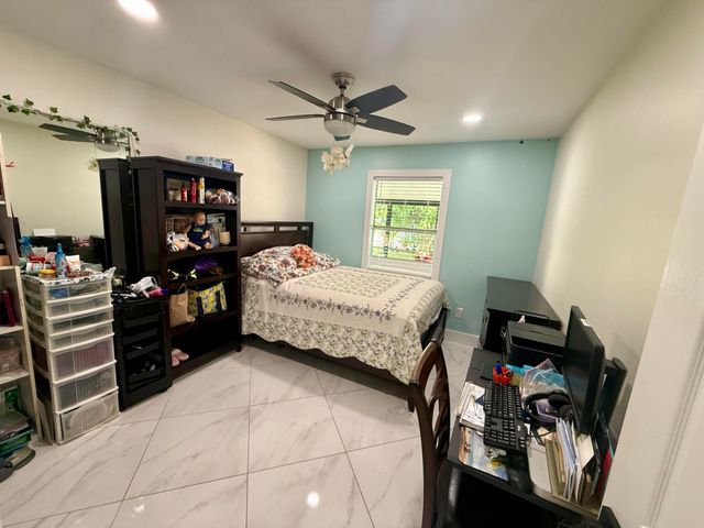 7743 Elwood Drive, Greenacres, FL 33467