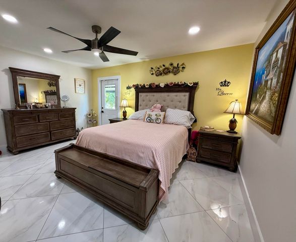 7743 Elwood Drive, Greenacres, FL 33467